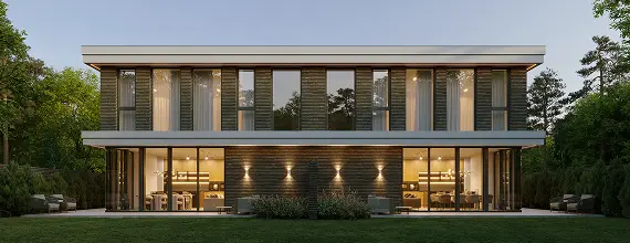 Luxury villa exterior with lit interiors, completed residential project