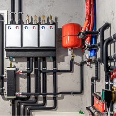 MEP engineering works with plumbing manifold and pipework