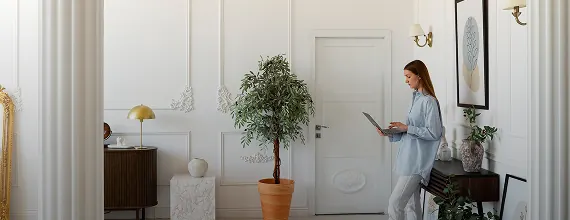 Homeowner reviewing project progress in a finished Dubai villa interior