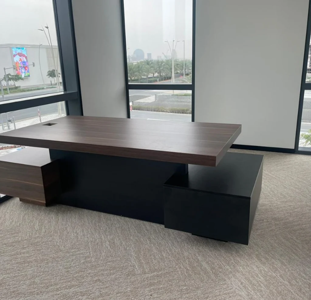 Office with executive desk and carpet tile flooring in Dubai